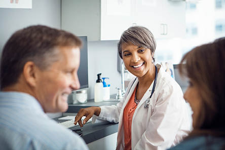 couple talking with doctor