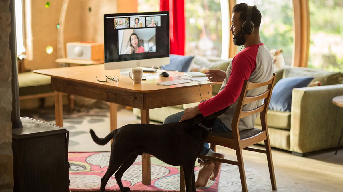 man attending video conference